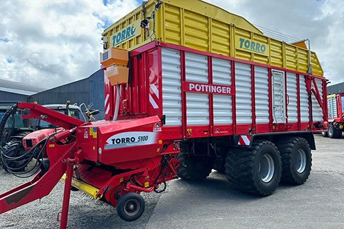 Granular silage additive on forage box